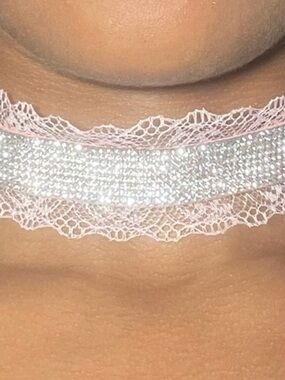 pink lace choker with a wide silver rhinestone band